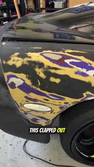 Black vinyl wrap on a Chevrolet Corvette - Aura Vinyl