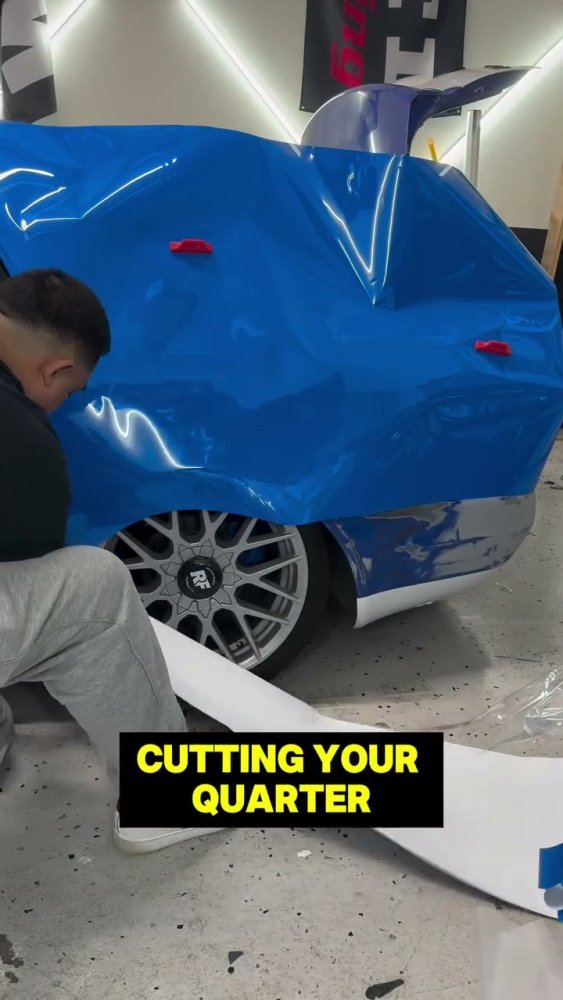 Blue vinyl wrap install on an Audi A4 - Aura Vinyl
