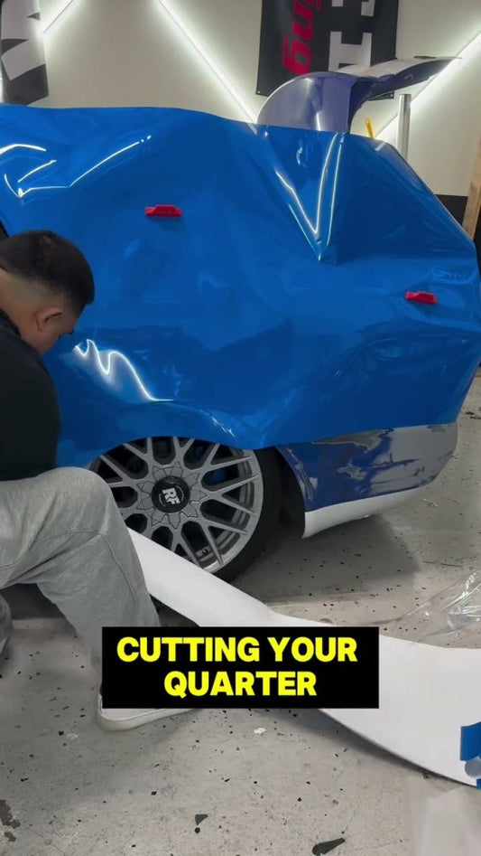 Blue vinyl wrap install on an Audi A4 - Aura Vinyl