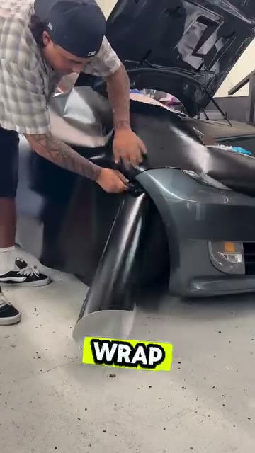 Dark Grey Wrap on a Tesla Model 3 Fender - Aura Vinyl