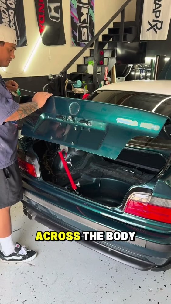 Green vinyl wrap on a 1992-1999 BMW M3 - Aura Vinyl