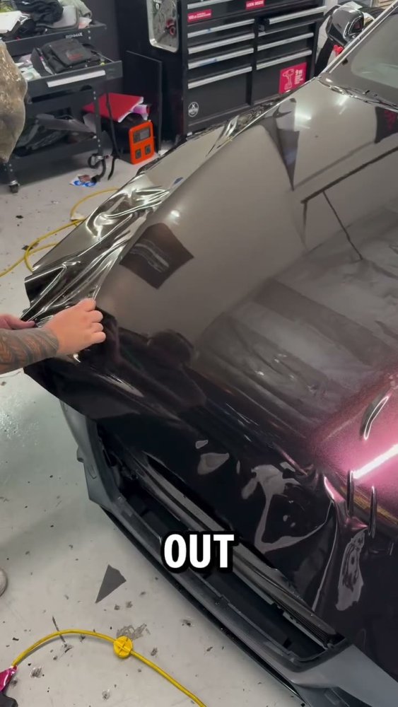 Grey vinyl wrap hood install on an Audi A6 - Aura Vinyl