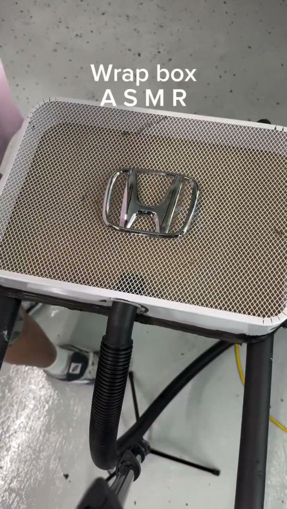 Hot Pink Vinyl Wrap on a Honda Emblem - Aura Vinyl