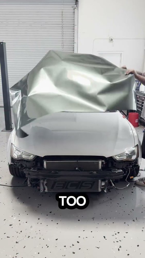 Measuring vinyl wrap on an Audi S5 - Aura Vinyl