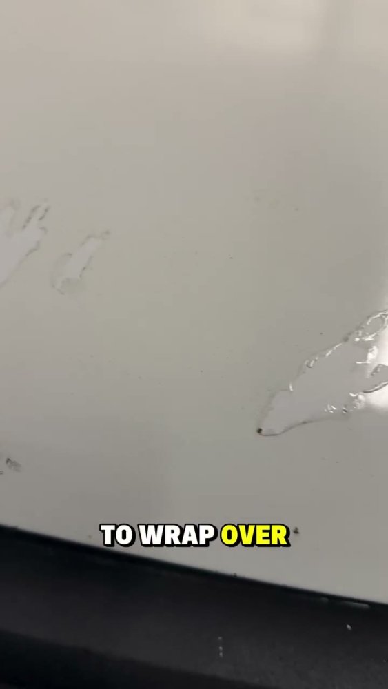 Prepping chipping paint for vinyl wrap on a white car - Aura Vinyl