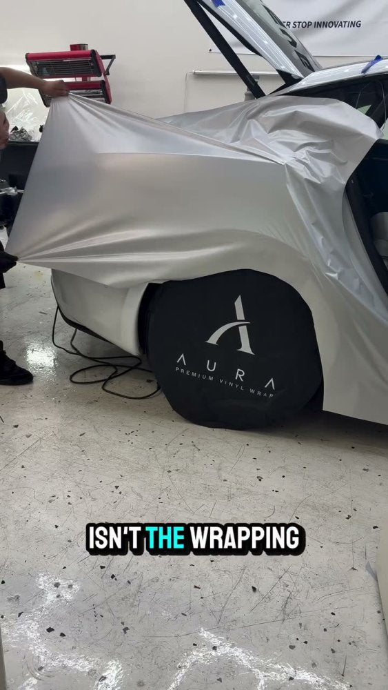 Quarter panel vinyl wrap on a Tesla Model 3 - Aura Vinyl