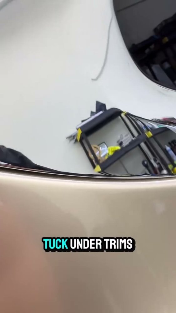 Tucking vinyl wrap on a Tesla Model 3 - Aura Vinyl