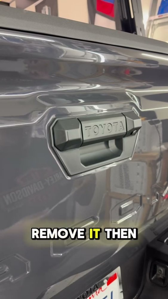Wrapping a Grey Toyota Tacoma Tailgate Handle - Aura Vinyl