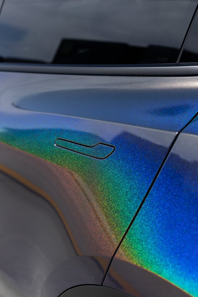 Gloss iridescent grey psychedelic wrap close‑up