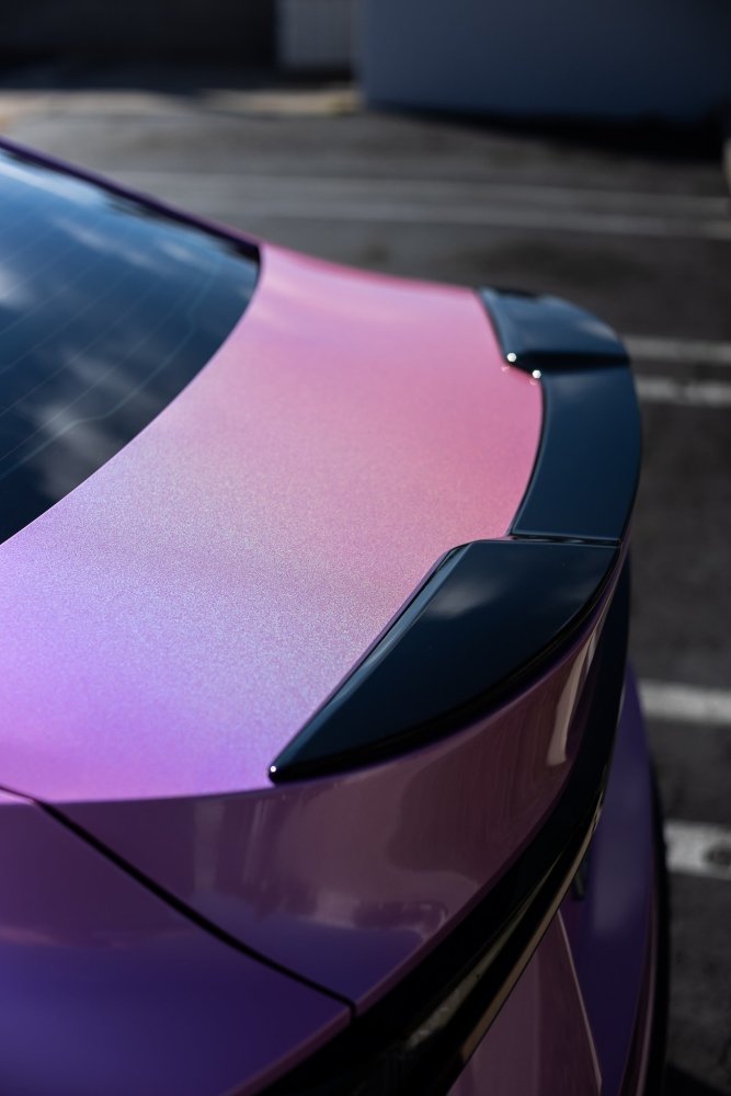 Pink iridescent gloss wrap close‑up