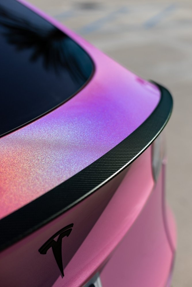 Gloss iridescent pink wrap on vehicle