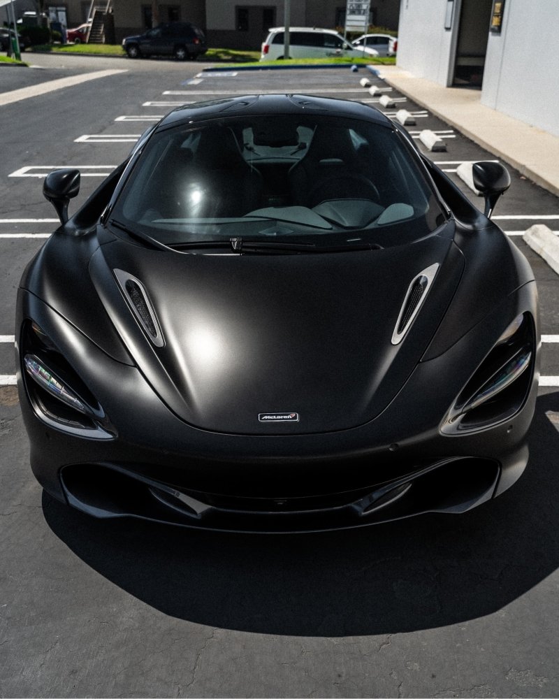 Car wrapped in Perfect Satin Black vinyl